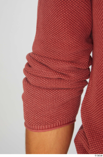 Nathaniel casual dressed forearm red sweater sleeve 0001.jpg